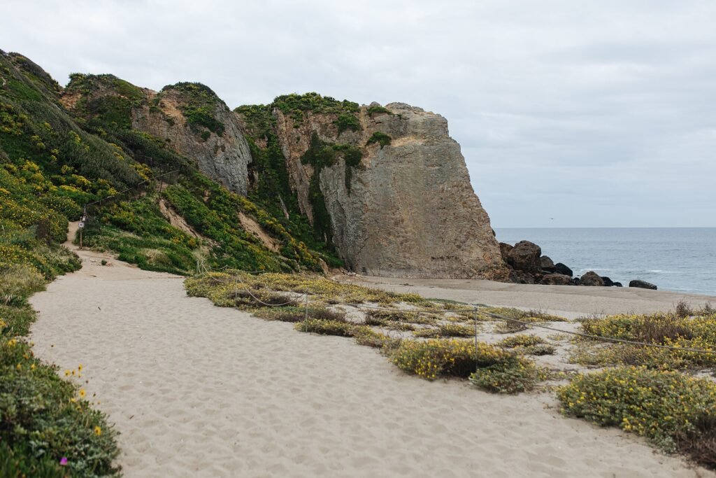 Sandy trail to the cliffs and ocean at Point Dume State Beach in Malibu